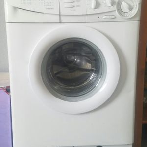 Machine à laver (fonctionne assez bien)