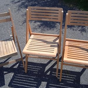 Trois chaises bois pliantes