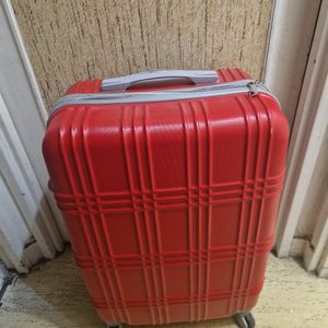 Valise rigide taille moyenne rouge