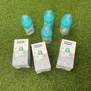 7 biberons complètement neufs