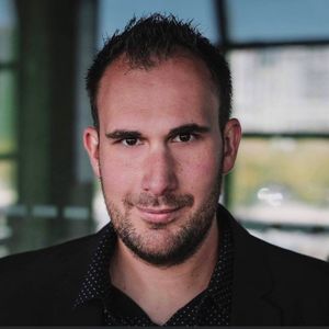 Marc E.