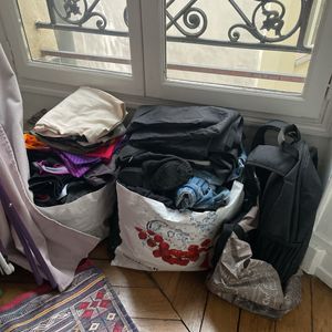 Donne 3 gros sacs de vêtements (S, M, L)