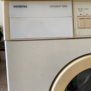 Machine à laver pour pièces