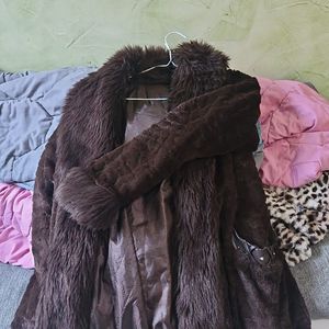 Manteau de fourrure 42 
