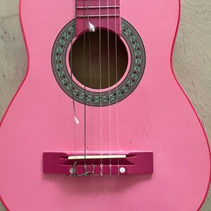 Guitare rose jouet