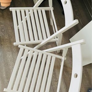 2 chaise pliantes blanches 