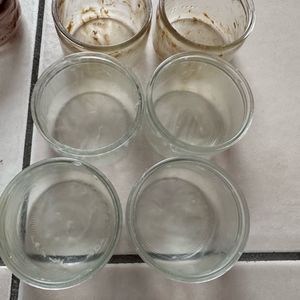 24 petits pots en verre