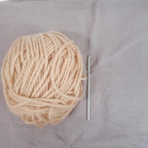 Pelotte de laine et crochet 