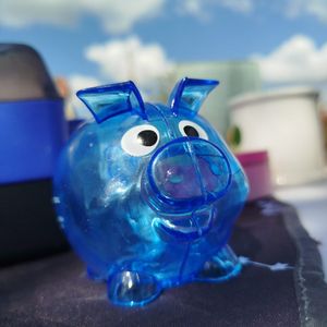 Tirelire cochon plastique bleu