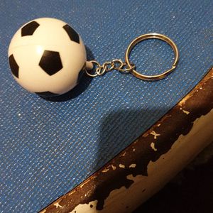 Porte clef foot comme neuf