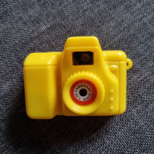 Mini appareil photo avec 8 photos à voir