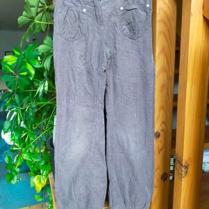 Pantalon 8ans gris / violine trous
