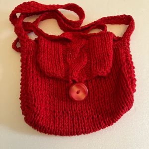 Petit sac rouge tricoté maison 😀