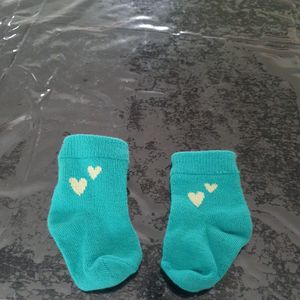 Donne chaussettes bébé 