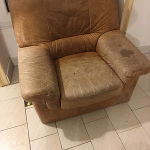 Urgent donne fauteuil marron en cuir
