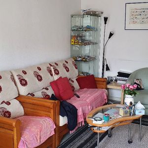 Canapé et fauteuil bois et tissus 
