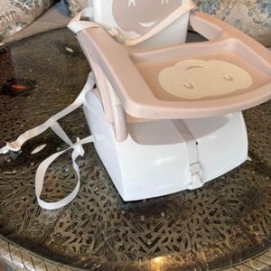 Recherche réhausseur de chaise bébé 
