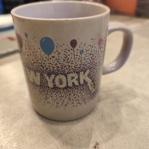Mug New York violet pastel 1 ébréchure dessous 