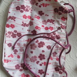 Donne sac toile blanc avec fleurs rose et violet