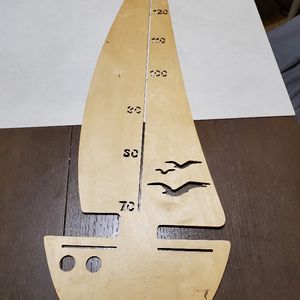 Toise en forme de voilier 