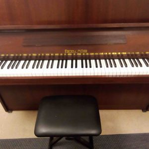 Piano droit en parfait état 