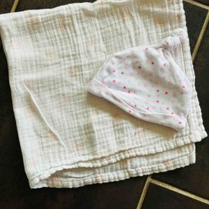 Lange blanc et bonnet pour bébé 