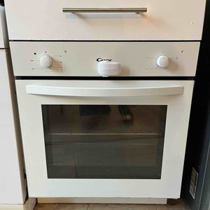 Donne Four électrique Candy bon état 