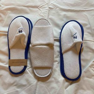 Pantoufles d’hôtel 