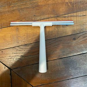 Raclette pour parois de douche