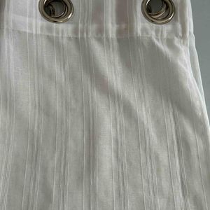 2 rideaux 2m70x1m40 (8 anneaux)