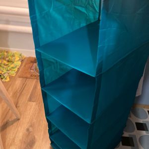 2 Rangement à mettre sur tringle 